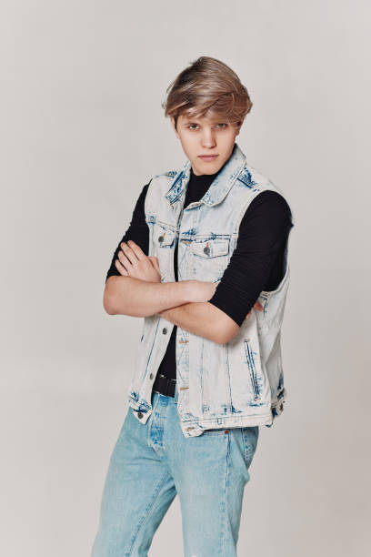 istock young handsome guy with modern haircut in denim 1398135355