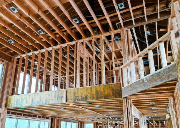 istock Construction framing in wood, buildings and houses 1398136249