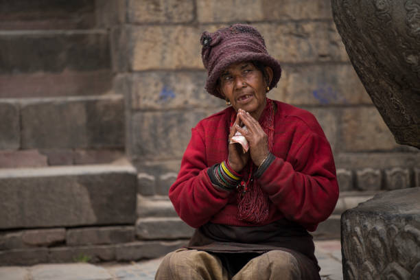 Kathmandu, Nepal- April 20,2019 : Portrait of older Nepalese in Patan Durbar Square.