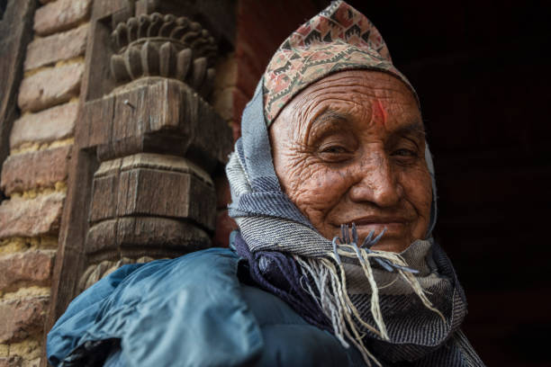 Kathmandu, Nepal- April 20,2019 : Portrait of older Nepalese in Patan Durbar Square.