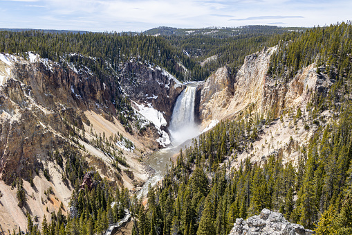 Hot spring, icy lake, nature, wild life, meadow, grand canyon of Yellowstone in Spring 2022