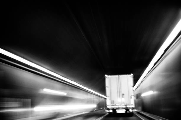 Truck driving  through a tunnel. motion blurred.