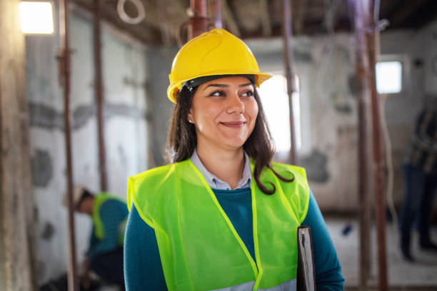 istock Portrait of female engineer at construction site 1398144016