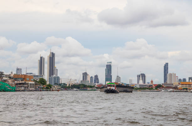 istock A Tug boat with a cargo ship on the Chao Phraya River in Bangkok Thailand 1398144164