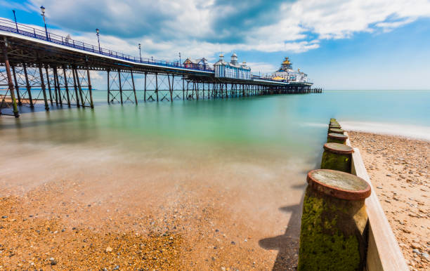 Eastbourne Pier Eastbourne Pier in England daytime long exposure eastbourne pier photos stock pictures, royalty-free photos & images