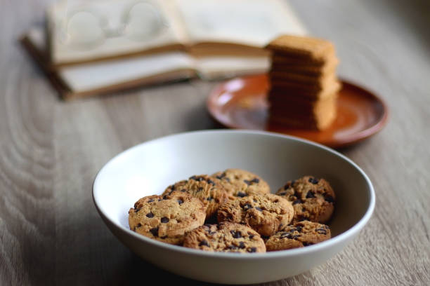 istock Cookies, Biscuits, Books and Glasses 1398145570