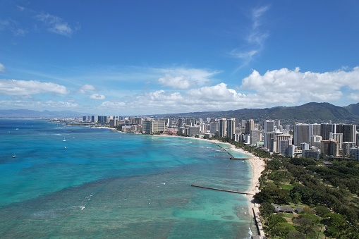 Drone shot of Waikiki Beach and Hotels looking westward along the shore