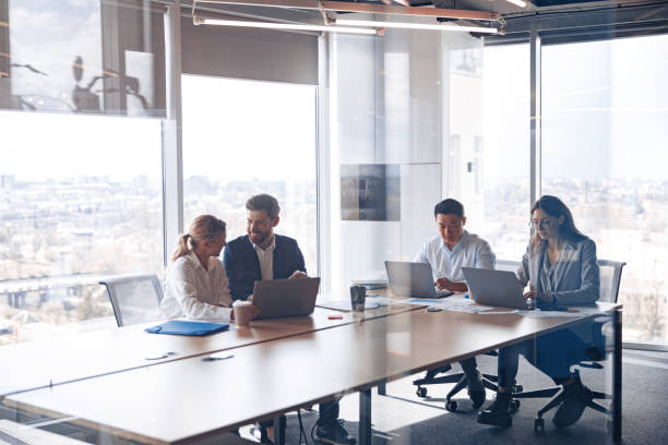 istock Business Team Professional Occupation Workplace Concept. Teamwork in modern office 1398149440