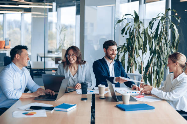 istock Creative and professional business team working on project in modern office 1398149473