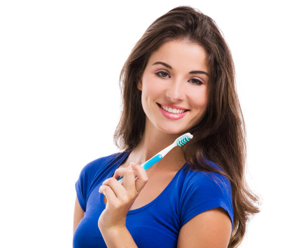 istock Beautiful woman with a toothbrush 1398150960