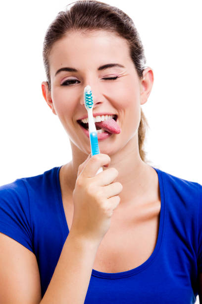 istock Beautiful woman with a toothbrush 1398150971