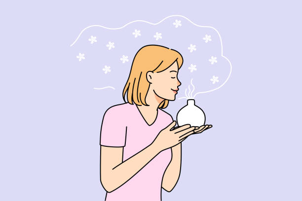 stockillustraties, clipart, cartoons en iconen met young woman smell fragrance from aromatherapy diffuser - ruiken