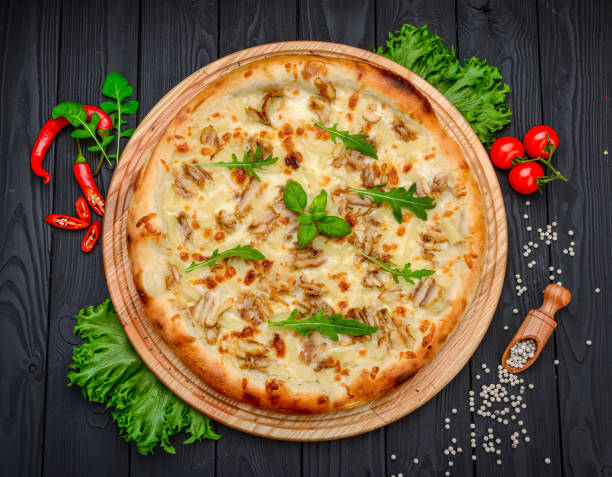 istock Tasty hawaiian pizza with chicken 1398155871
