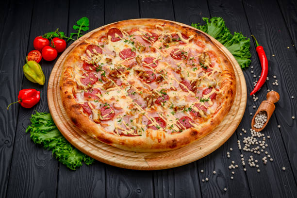 istock Delicious and fresh pepperoni pizza with vegetables 1398155885