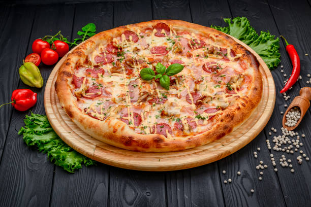 istock Delicious and fresh pepperoni pizza with vegetables 1398155887