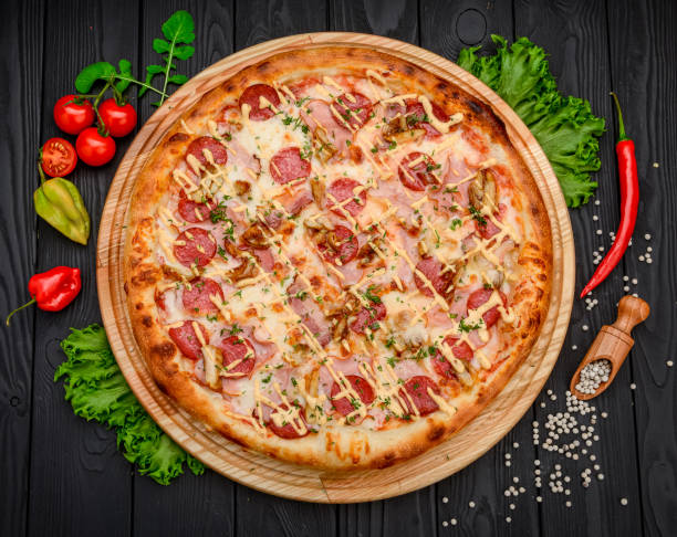 istock Delicious and fresh pepperoni pizza with vegetables 1398155890