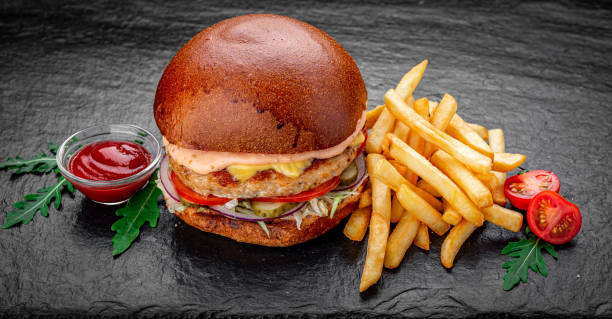 istock Chicken burger is served in a restaurant 1398157555