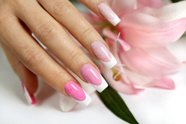 istock French pink manicure with a small glitter. 1398161224