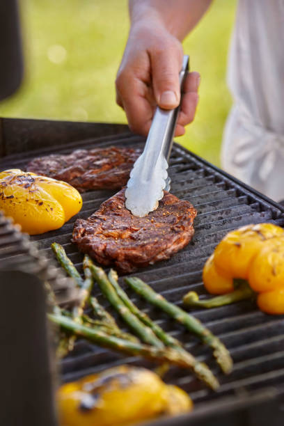 istock Grilling Rib Eye Steaks on the BBQ 1398165535
