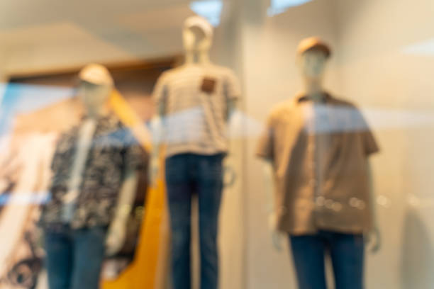 istock Blurred Men's Clothing and Hats in Store Window 1398166600