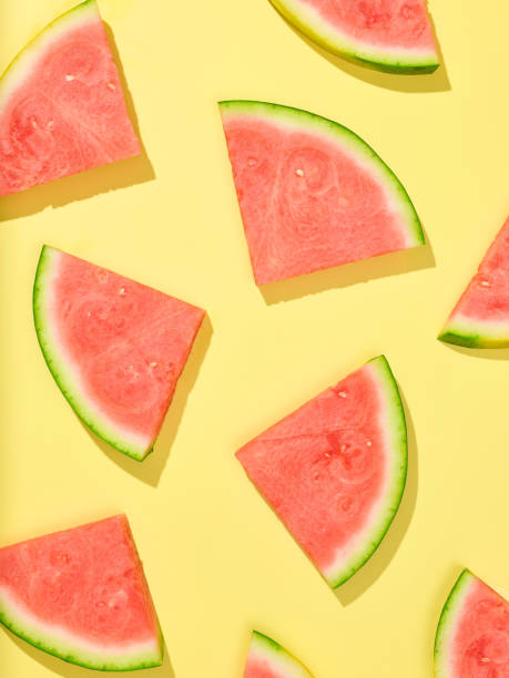 istock watermelon slices on yellow background 1398168729