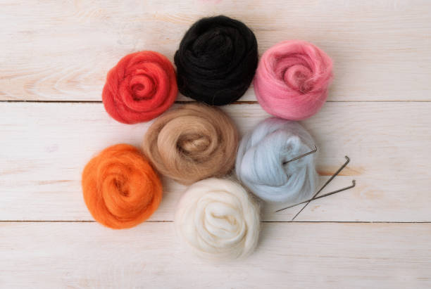 Top view of wool needle felting kit isolated on white
