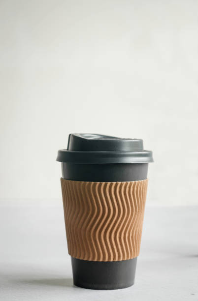 istock Kraft paper coffee cup with black cap. Disposable cup, Zero waste 1398171912