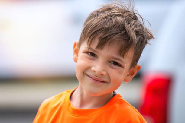 Smiling caucasian little boy looking at the camera