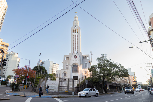 Caxias do Sul, Rio Grande do Sul, Brazil - 12th May, 2022: View of Sao Pelegrino Church in Caxias do Sul, traffic and pedestrians