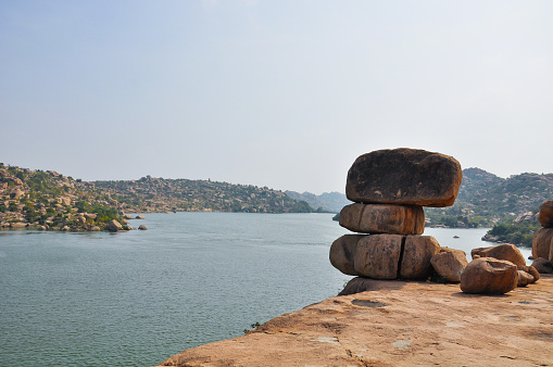 Unusual construction of stones on the bank of the river in Hampi, Karnataka, India