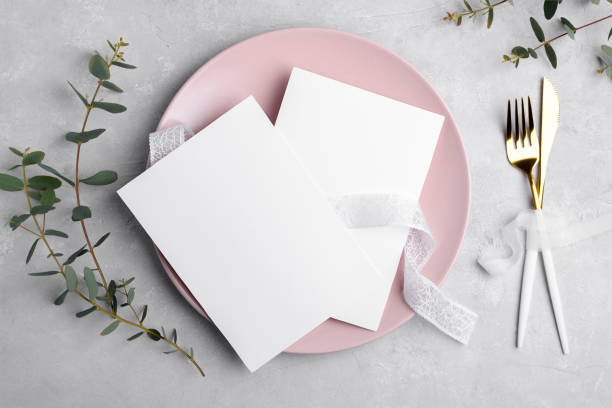 istock invitation card mockup 5x7 with eucalyptus, Menu card mockup with festive wedding or birthday table setting, pink plate 1398177656