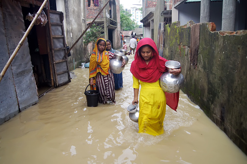 The lower part of Sylhet city has been flooded. Acute shortage of clean drinking water. People from the affected areas are collecting water from far away. The photo taken from Sylhet in Bangladesh on 17 May 2022.