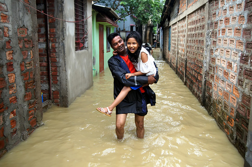 Roads in the lower part of Sylhet city have been flooded. Pedestrians and vehicles in distress. The photo taken from Sylhet in Bangladesh on 17 May 2022.