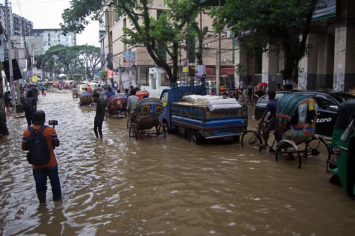 Roads in the lower part of Sylhet city have been flooded. Pedestrians and vehicles in distress. The photo taken from Sylhet in Bangladesh on 17 May 2022.