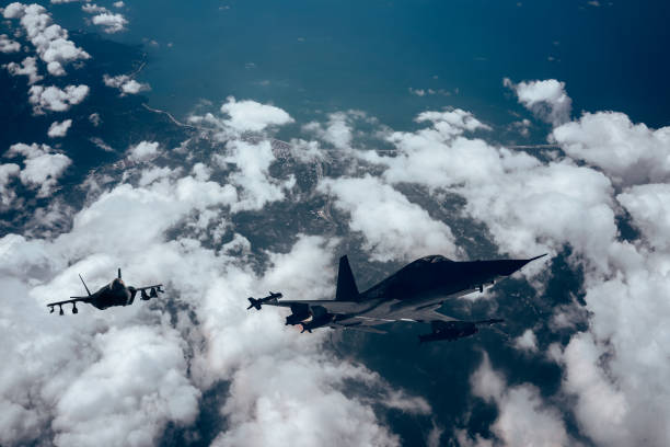 istock Jet fighters flying over the clouds. 1398187726