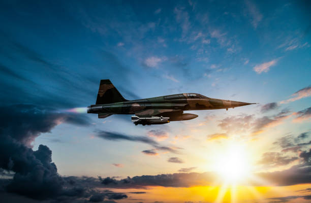 istock Jet fighters flying over the clouds. 1398188734