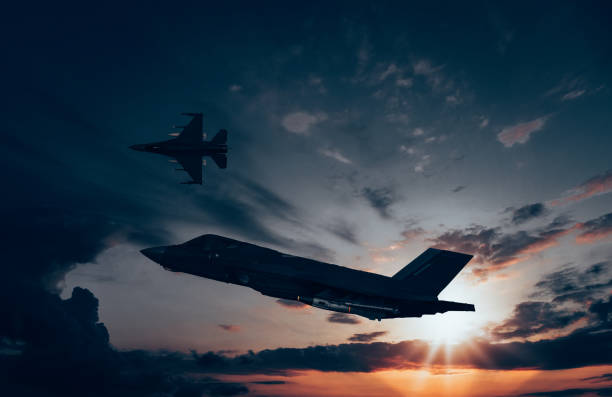 istock Jet fighters flying over the clouds. 1398188809