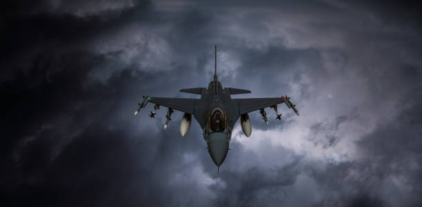 istock Jet fighters flying over the clouds. 1398189080