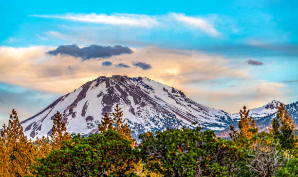 Lassen Peak and clouds at sunset.