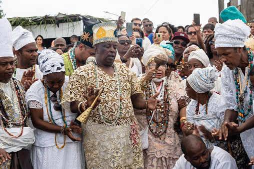 Santo Amaro, Bahia, Brazil - May 15, 2022: Members of the Candomble religion are seen during a religious celebration in a terreiro in the city of Santo Amaro da PurificaÃ§Ã£o in Bahia, Brazil.