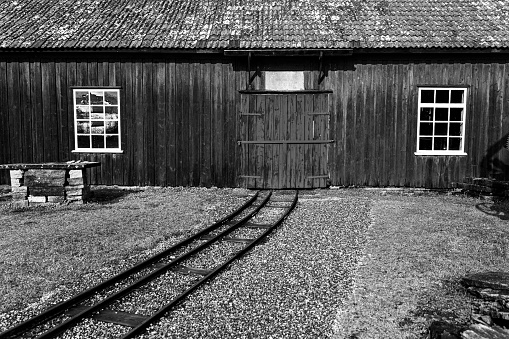 Rail road track in to an old train garage