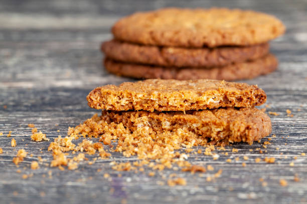 istock delicious crispy cookies broken into pieces with crumbs 1398197483