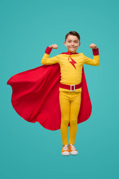 istock Strong superhero child showing power 1398204357