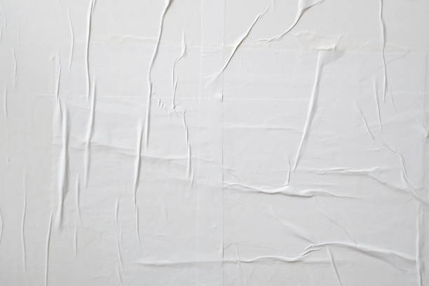 istock white crumpled and creased paper poster texture background 1398204542