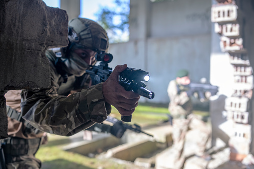 soldier prepares weapon ammunition