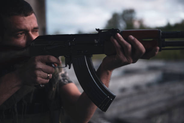 istock Soldier aiming for the enemy in the war. 1398204791