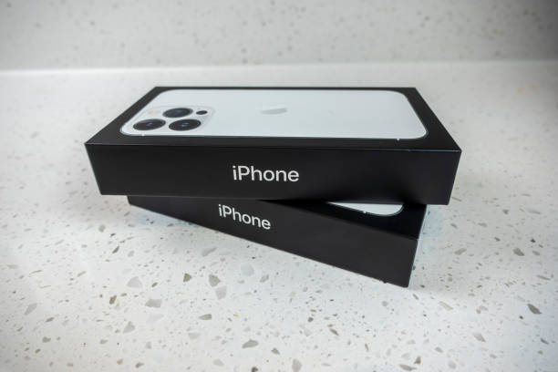 View of two iPhone 13 Pro boxes on a kitchen counter inside a home Seattle, WA USA - circa May 2022: View of two iPhone 13 Pro boxes on a kitchen counter inside a home iphone 13 photos stock pictures, royalty-free photos & images