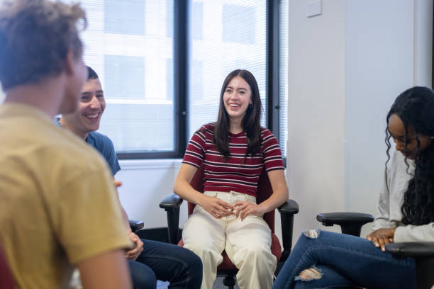 istock Happy teenager attending successful therapy session 1398206081