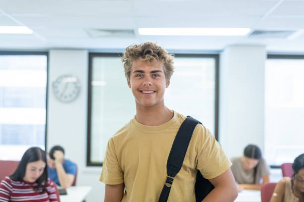 istock Happy male high school student 1398206085