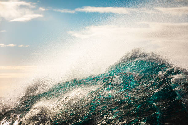 istock Abstract ocean wave breaking in rough seas with soft paste skies 1398224256